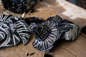 Obsidian crafts. Elaboration of obsidian crafts at the Teotihuacan archaeological site. photo