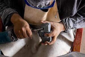 Artisan. Elaboration of obsidian crafts at the Teotihuacan archaeological site. photo