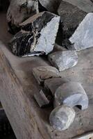 Elaboration of obsidian crafts at the Teotihuacan archaeological site. Vertical image. photo