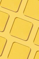 Minimal pattern eye shadow yellow swatches with shadow, monochrome photoas background, refill compact eyeshadow, shiny colored powder for makeup, square shape metal pack, cosmetic texture photo