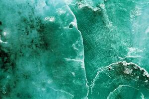 Abstract texture of marine clam shell, natural patterns and green blue color organic textured background. Natural details and gradients, natural aesthetics and organicity, minimal nature photo