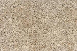 Sand texture surface. Close up top view of sand on shore salt lake, minimal nature aesthetics backdrops. Sandy abstract macro background. Selective focus, Above view, nature pattern photo