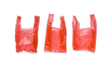 Set of Close up Red plastic bags isolated on white background, cut out object, design element. Single-use polythene packet, Biodegradable packaging waste, Disposable bag, bag free day photo