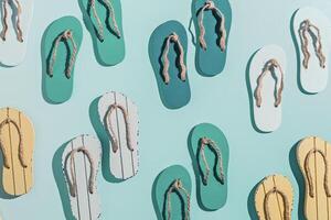 Summer flip flops flat lay, minimal repeat pattern, set of beach footwear vivid colored, top view still life with womans slide sandals, many shoes, summer beach holiday concept, shadow sunlight photo
