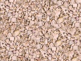 A close up of a stone wall with many different types of rocks video