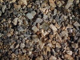 A close up of a rock wall with many different types of rocks video
