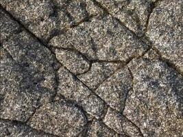 A close up of a rock with cracks and cracks video