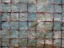 un Roca pared con cuadrícula de diferente colores video
