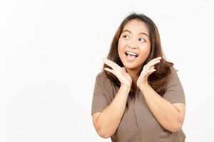 A woman is making a surprised face while standing photo