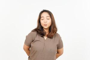 A woman making a funny face while standing photo
