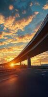 A breathtaking view of a sunset over an urban highway, showcasing dramatic clouds and vibrant colors in the sky. photo