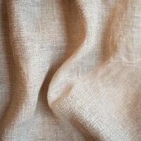 A piece of fabric with a pattern of lines and dots. The fabric is light in color and has a soft texture photo