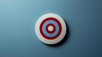 A white and red target with blue circles in the middle. The image is of a round object with a red and blue circle in the middle photo