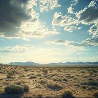A serene desert scene featuring a wide-open landscape, scattered shrubs, and a dramatic sky with fluffy clouds. photo