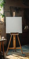 A serene artist studio with a blank canvas on an easel, bathed in natural light, ready for creativity. photo