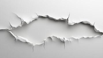 Torn Paper Hole on White Background with Jagged Edges and Shadow Creating a 3D Effect photo