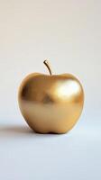 Golden Apple on Minimalist Background Symbolizing Luxury, Wealth, and Elegance photo