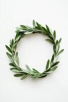 Wreath made of green leaves is placed on a white background photo