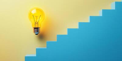 Bright Yellow Light Bulb on Yellow and Blue Background photo