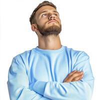 Contemplative Man in Light Blue Sweatshirt photo