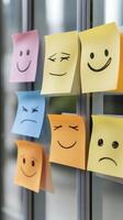 Colorful Sticky Notes Showcasing Diverse Facial Expressions photo