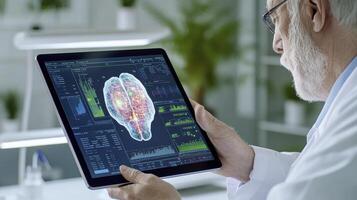 Senior Scientist Analyzing Brain Scan on Tablet photo