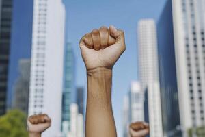 Raised Fist in Urban Setting photo