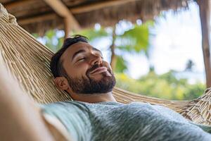 Relaxed Man in Hammock, Tropical Setting photo