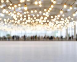 Warm String Lights illuminate a Blurred Event Space photo