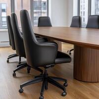 Elegant Conference Room Design A Showcase of Modern Office Furniture and Layout, Featuring Comfortable Black Leather Chairs Around a Spacious Wooden Table Perfect for Business Meetings and photo