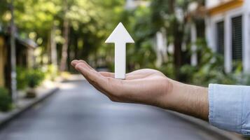 Elevate Your Perspective A Symbolic Journey of Growth, Direction, and Aspiration Explore the Power of Forward Motion, Represented by a Guiding Arrow in the Palm of a Hand Envision Success, Progress photo