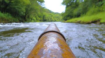 Experience the Serenity of Nature A Captivating Journey Down a Flowing River Discover Lush Greenery, Sparkling Water, and the Thrill of Adventure Immerse Yourself in the Tranquility of the Outdoors photo