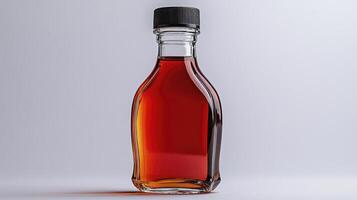 Explore the Richness of Amber Nectar A Close-Up Still Life Photograph of Golden Liquid in a Classy Glass Bottle with a Sleek Black Cap, Perfect for Showcasing Natural Syrup, Fine Liquor, or Artisanal photo