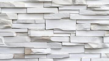 Explore the timeless elegance of a white stacked stone wall, a captivating texture that brings sophistication and modern charm to any space, offering a versatile backdrop for design ideas and photo