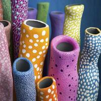 Vibrant and Abstract Tubes A Captivating Close-Up of Colorful, Textured Shapes, Evoking Underwater Marine Life with Whimsical Patterns and Striking Visuals, Perfect for Artistic Backgrounds and photo