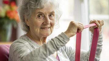 Active Senior Woman Enjoying Home Exercise with Resistance Bands A Portrait of Healthy Aging, Featuring a Smiling Elderly Lady Maintaining Fitness and Mobility Through Gentle Workout Routines photo