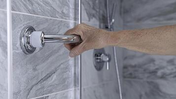 Explore this meticulously detailed close-up image showcasing the installation of a grab bar in a modern bathroom, emphasizing safety and accessibility features for enhanced mobility and support photo