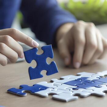 Solving a Puzzle Exploring Problem Solving, Strategy, and Teamwork with a Jigsaw Puzzle Piece Discover the Benefits of Puzzle Games and Enhance Your Cognitive Skills with Engaging Activities photo