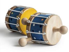 Small Handcrafted Drums with Mallets on White Background photo