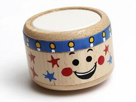 Smiling Wooden Toy Drum with Stars and Blue Stripes photo