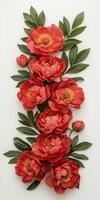 Vertical Arrangement of Coral Peonies and Green Leaves photo