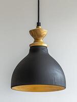 Black and Gold Pendant Lamp with Wooden Accent photo
