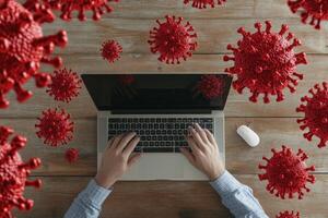 Person Working on Laptop Amidst Digital Virus Simulation photo