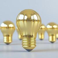 Golden Lightbulb Innovation and Leadership Concept photo
