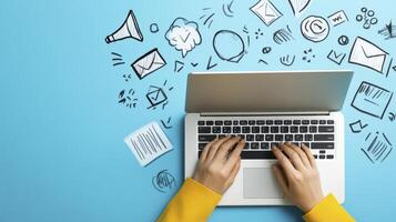 Hands Typing on Laptop with Digital Marketing Icons photo