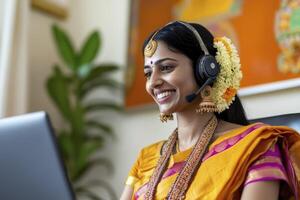 Smiling Woman in Traditional Indian Attire Working From Home photo