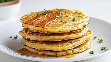 Delicious Stack of Golden Pancakes with Maple Syrup Drizzle A Close-Up Shot Showcasing Fluffy Texture and Homemade Goodness, Perfect for Breakfast or Brunch Explore this Culinary Masterpiece Indulge photo