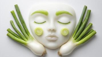 Discover the serene beauty of vegetable art, a creative composition featuring a peaceful face crafted from a white mask and adorned with vibrant green onions Explore the whimsical charm of this photo