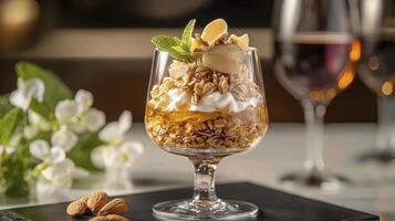 Indulge in a Delicious Dessert Parfait A Captivating Close-Up of a Glass Filled with Layers of Creamy Yogurt, Crunchy Granola, Sweet Honey, Toasted Almonds, and a Fresh Mint Garnish, Perfect for Food photo