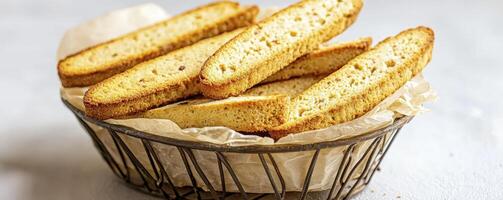 Delicious Biscotti in a Basket A Mouthwatering Close-Up Shot of Italian Almond Biscotti Biscuits, Perfect for Pairing with Coffee or Dessert Wine Capture the Authentic Taste of Italy with These photo